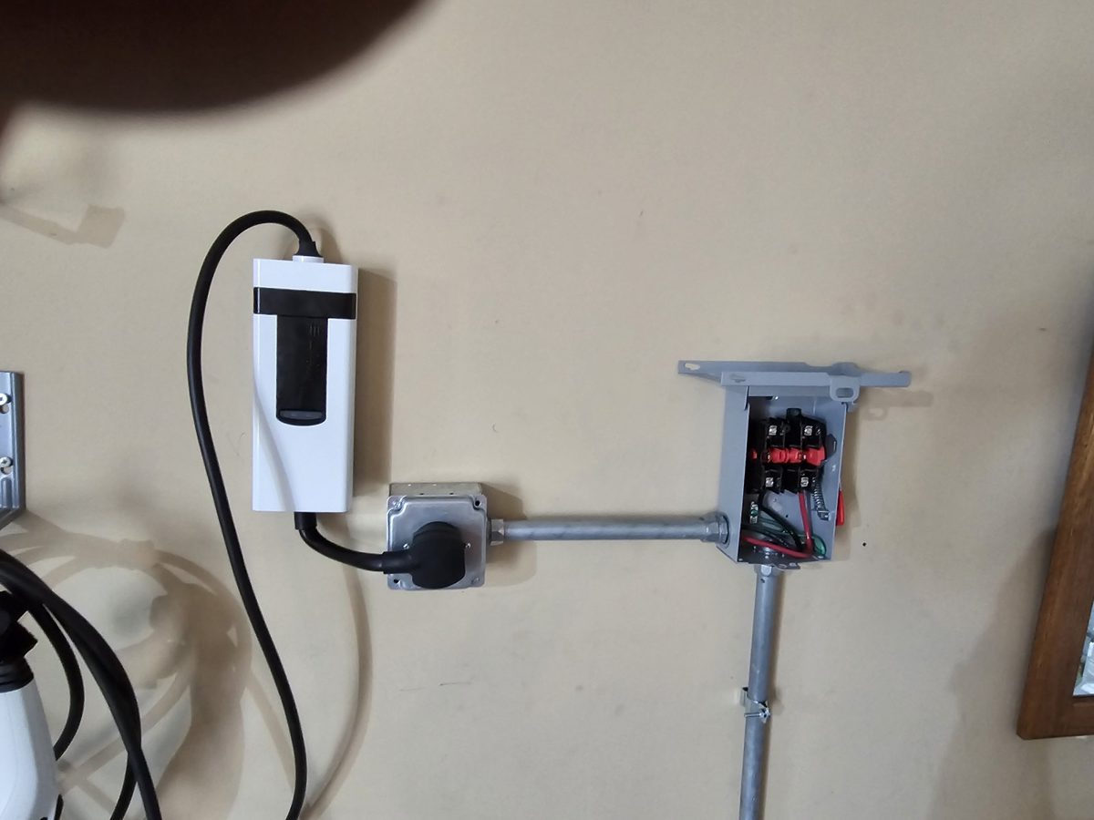 Finished EV charger install with tidy wiring